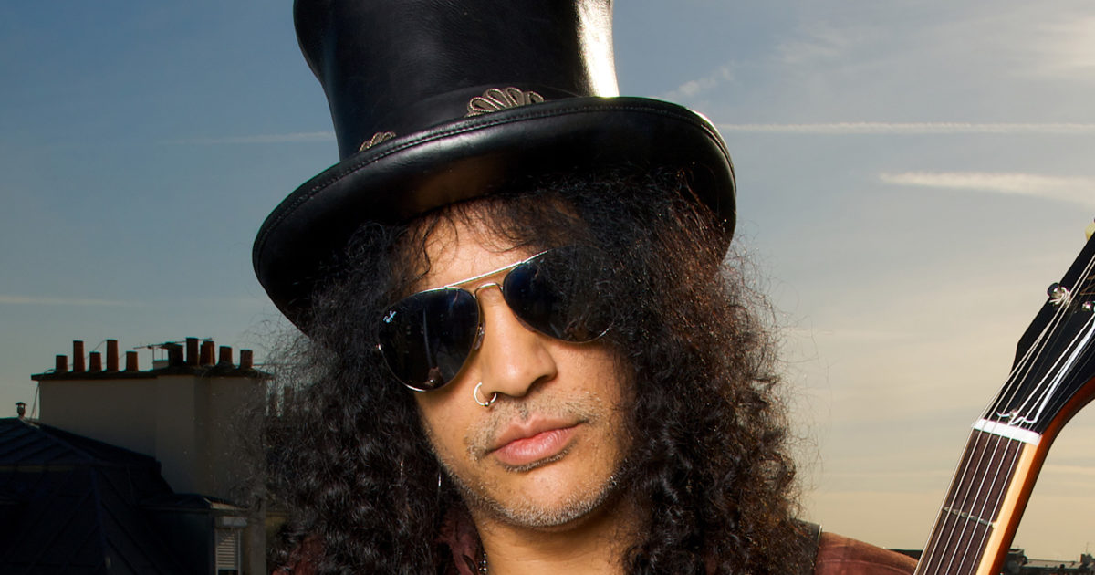 Former Guns N' Roses guitarist Slash signs copies of his autobiography ' Slash' at Waterstone's in Piccadilly, London Stock Photo - Alamy